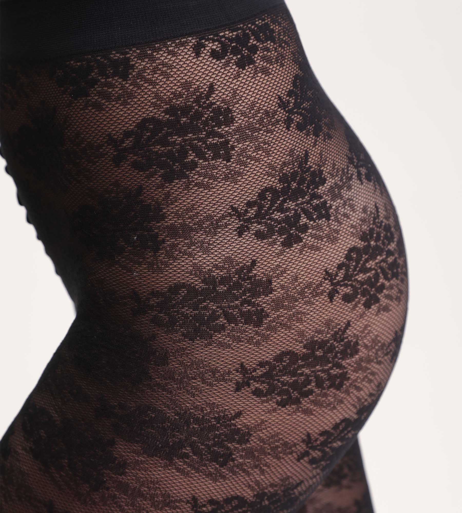 DIM Black tights with floral bouquet Dim Style